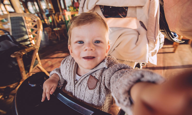 can a 4 month old sit in a stroller