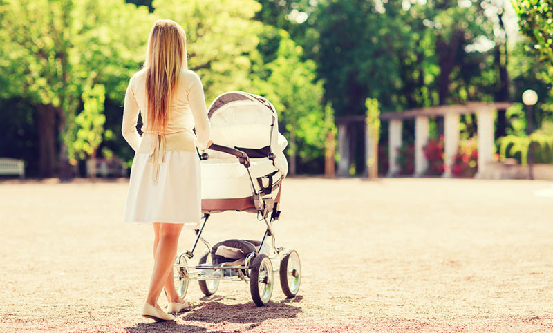 walking newborn in stroller